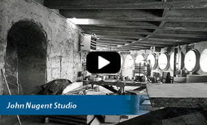Thumbnail for YouTube video, John Nougent Studio with play button overlayed