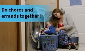 Mother and child doing laundry
