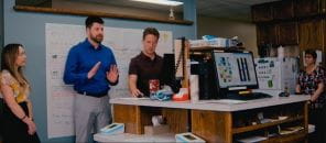 Dr. Harrison, a family and emergency medicine physician in Swift Current talking to his team