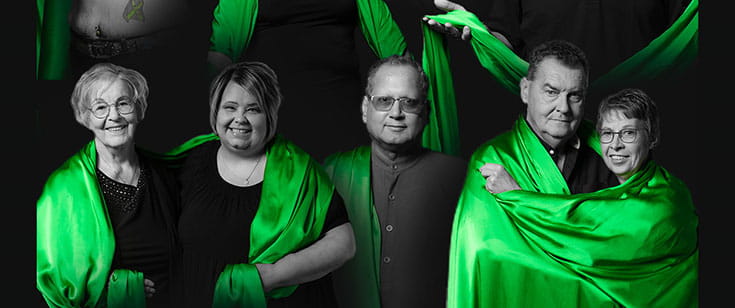 Goup of people wearing green cloth