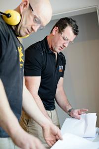 Gerard and colleague at work