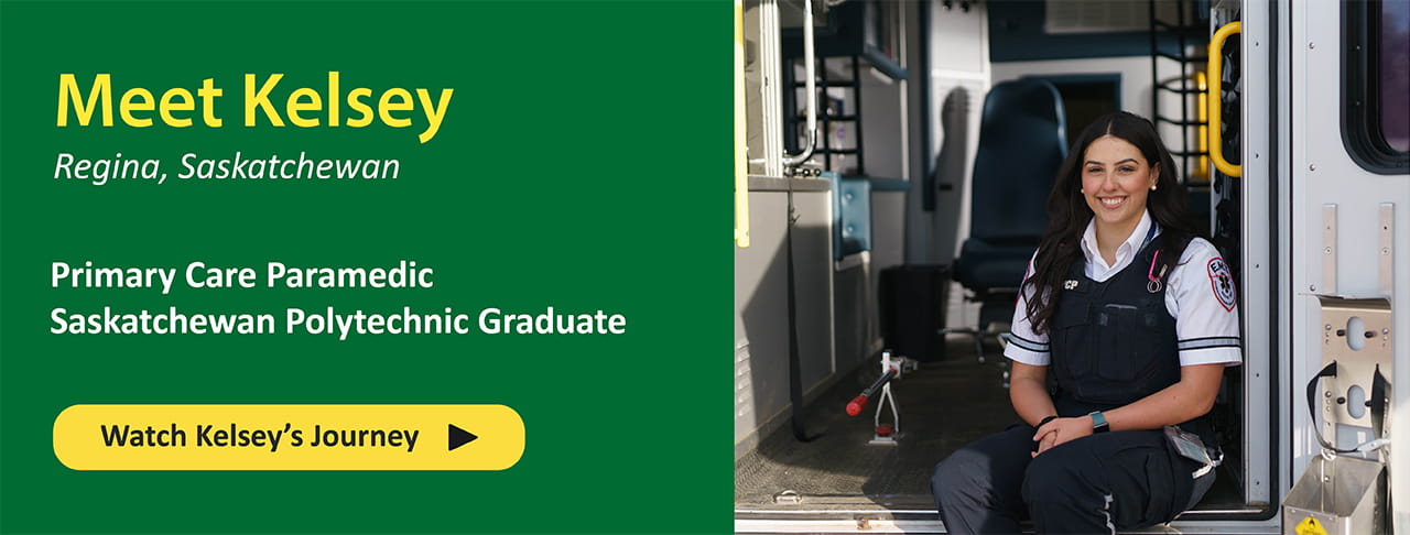 Female Paramedic sitting in the back of an ambulance