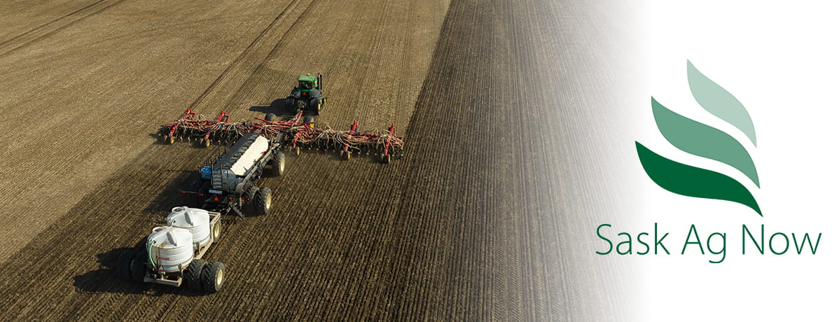 Seeder in field with Sask Ag Now logo