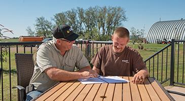 People reading at a table