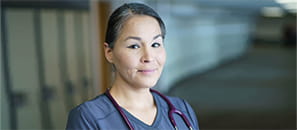 Nursing student in a school hallway 