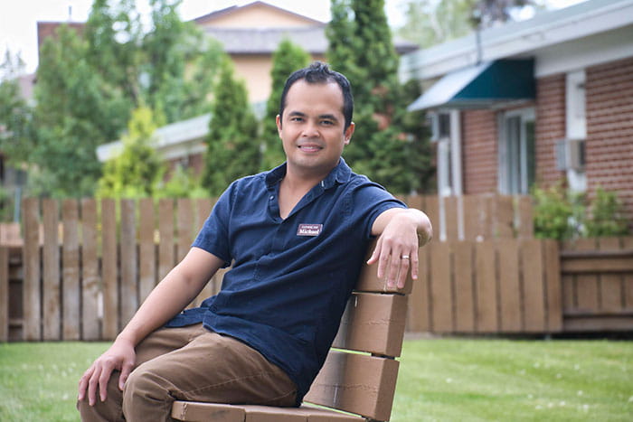 Michael Antiola at work sitting outside