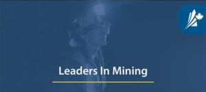 Leaders in Mining – Worker in mining gear looking up.