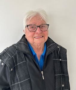 A woman smiling for a picture