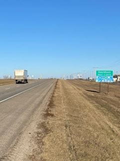 A truck driving on Highway 11 south Davidson Access
