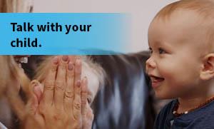 Parent talking to young child