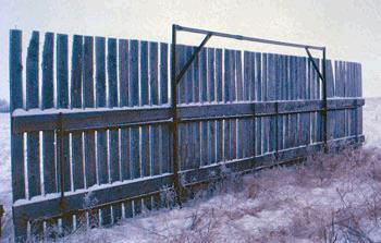 Steel tubing at top of fence