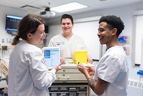 Nursing students talking and smiling